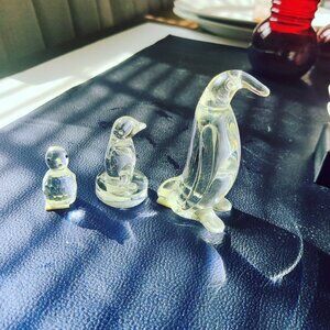 A Penguin Parade. Three Penguins in Crystal Glass looking impeccable.